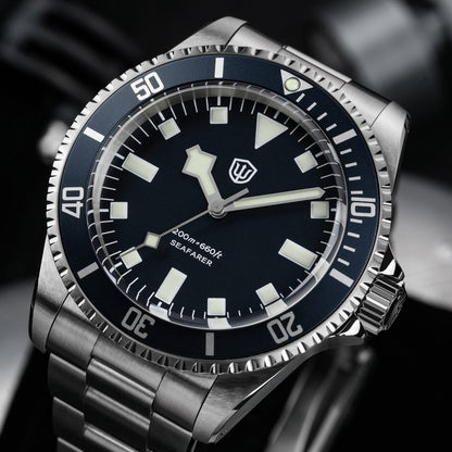 Watchdives WD5514Q 40mm quartz dive watch, blue dial with snowflake hands and white indices, angled wrist shot, 316L stainless steel bracelet.