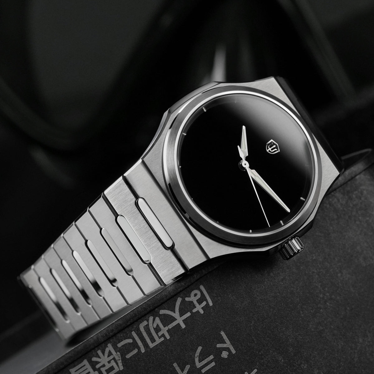 Watchdives WDC0001 PREMIER black dial watch, dramatic side-angle product photo