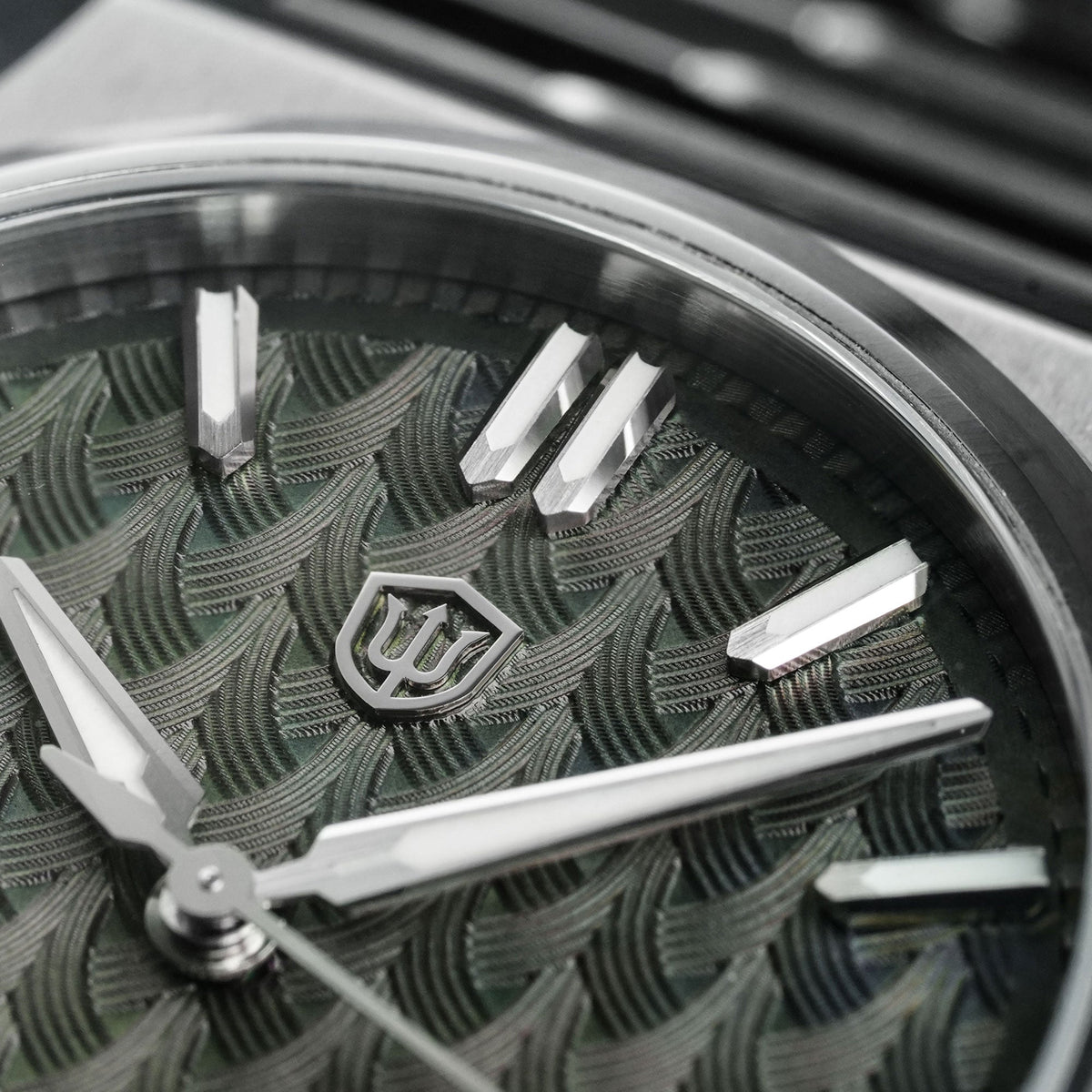 Watchdives WDC0001 PREMIER green dial watch with bracelet links in close-up