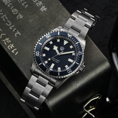 Watchdives WD5514Q 40mm quartz dive watch, blue dial with snowflake hands and white indices, watch displayed on textured surface, 316L stainless steel bracelet.