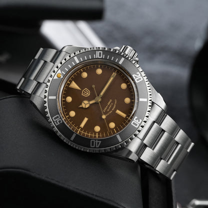 Watchdives WD5514Q 40mm quartz dive watch, tropical brown dial with yellow indices, angled side view, 316L stainless steel bracelet.