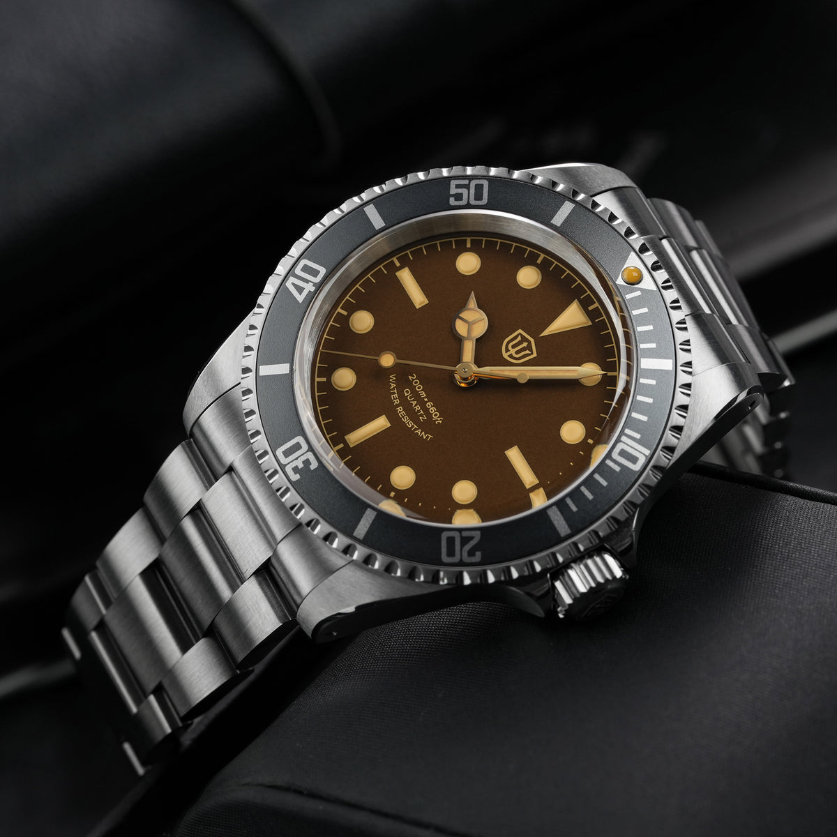 Watchdives WD5514Q 40mm quartz dive watch, tropical brown dial with yellow indices, dial and bezel close-up, 316L stainless steel bracelet.