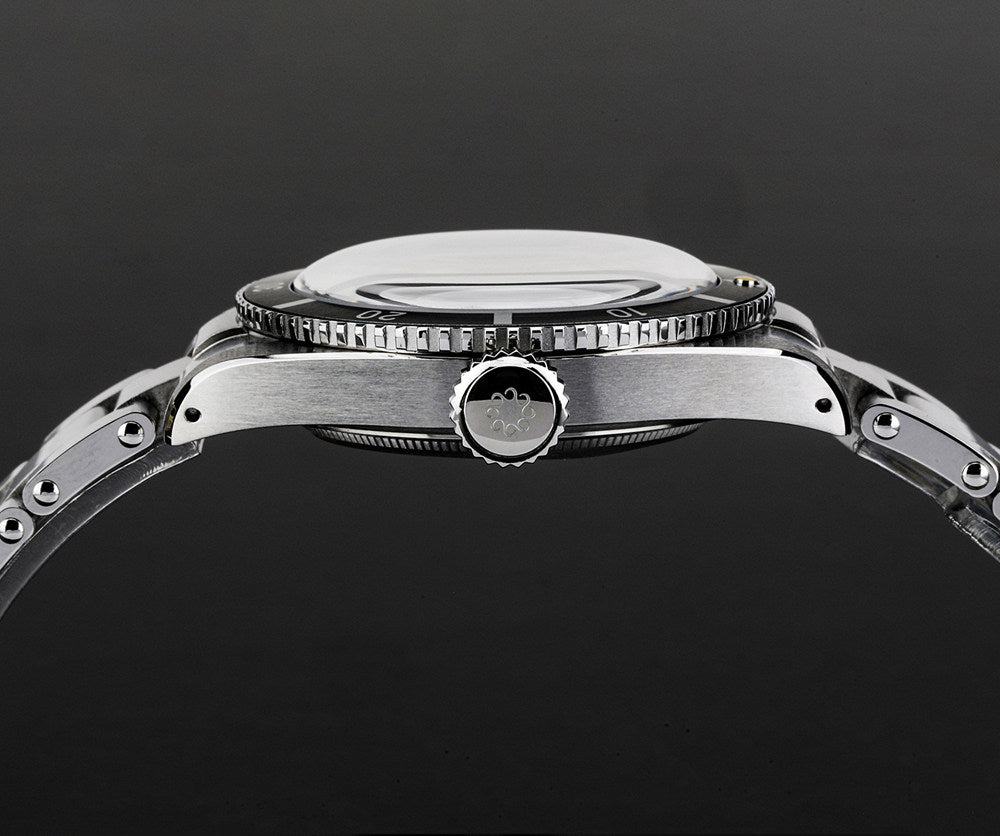 Octopus Kraken OCT-0028 slim case side view with domed sapphire crystal and polished steel case