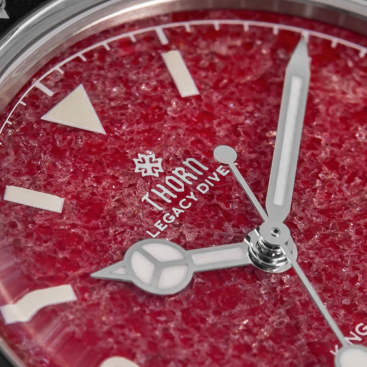 THORN T029 red garnet dial texture and watch hands close-up