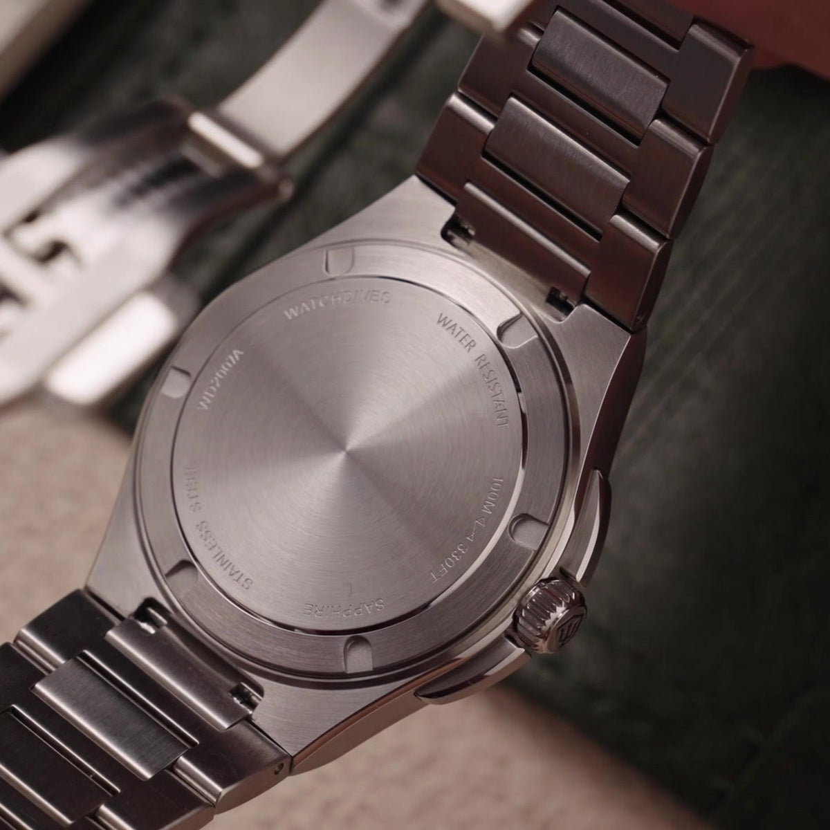 Watchdives WD2007A stainless steel case back with 100m water resistance marking