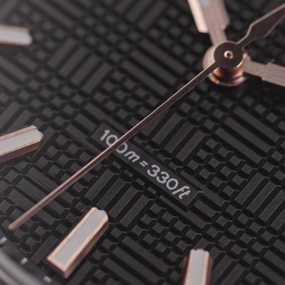 Watchdives WD2007A black dial macro showing geometric texture and hour markers