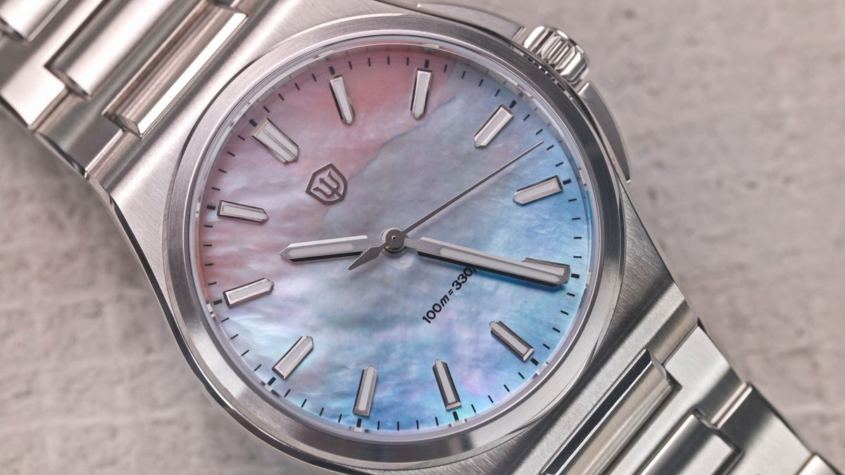 Watchdives WD2007A mother-of-pearl dial close-up showing natural iridescence